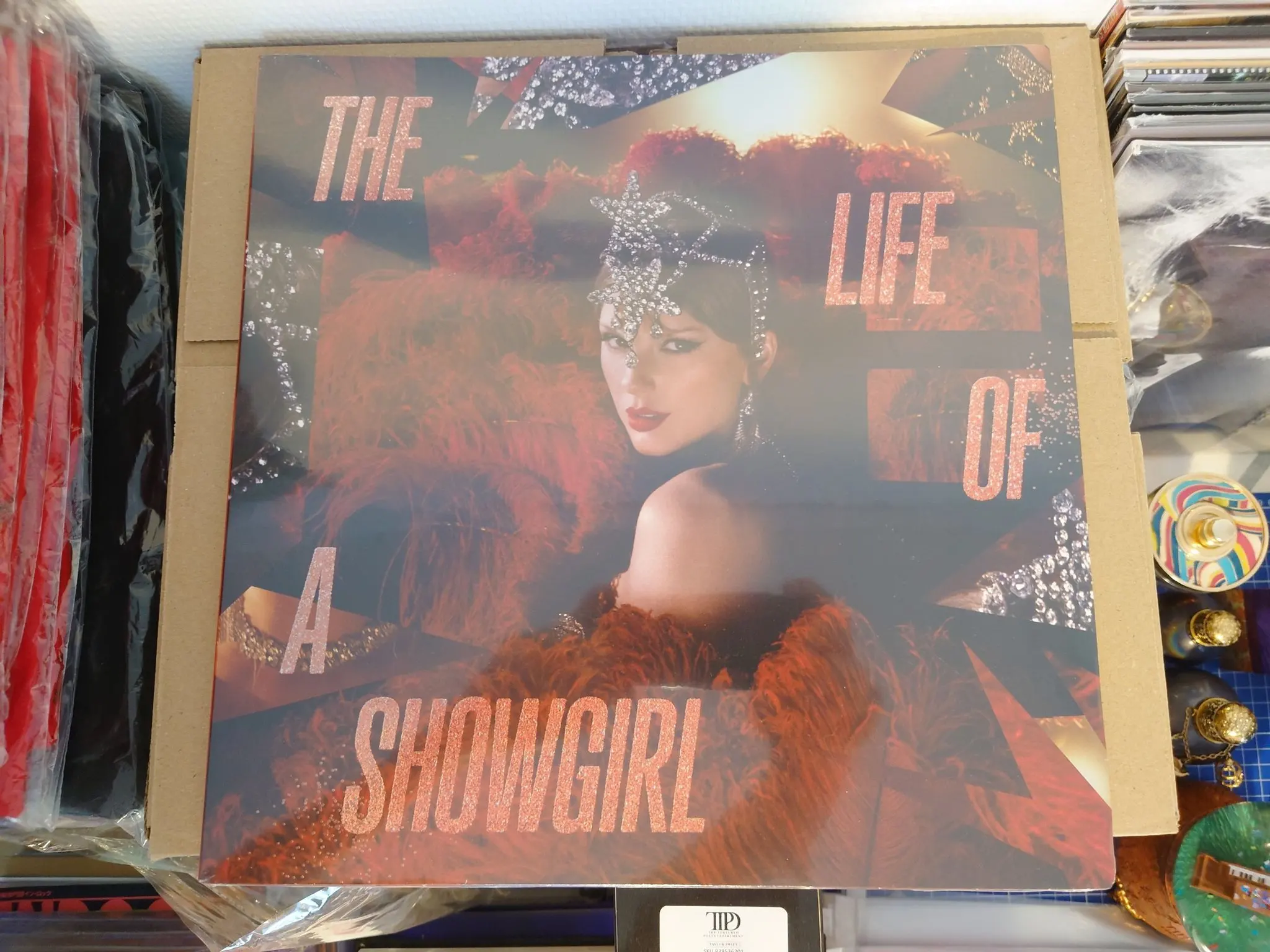Taylor Swift - Life of a Showgirl: The Tiny Bubbles in Champagne Edition vinylskiva till salu